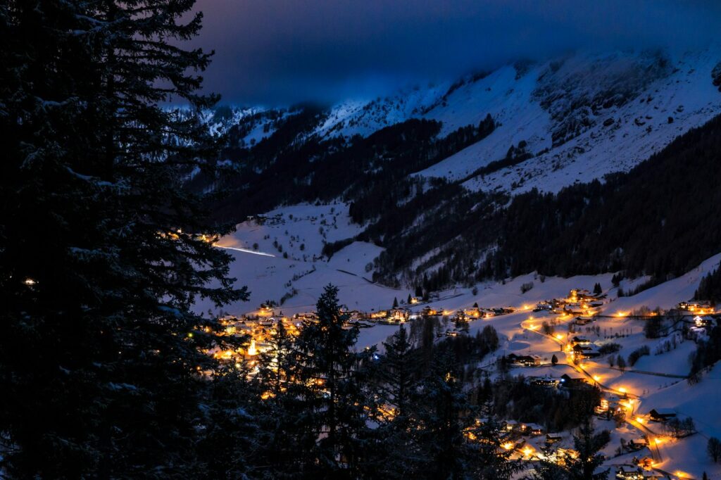Snow-covered houses at dusk
